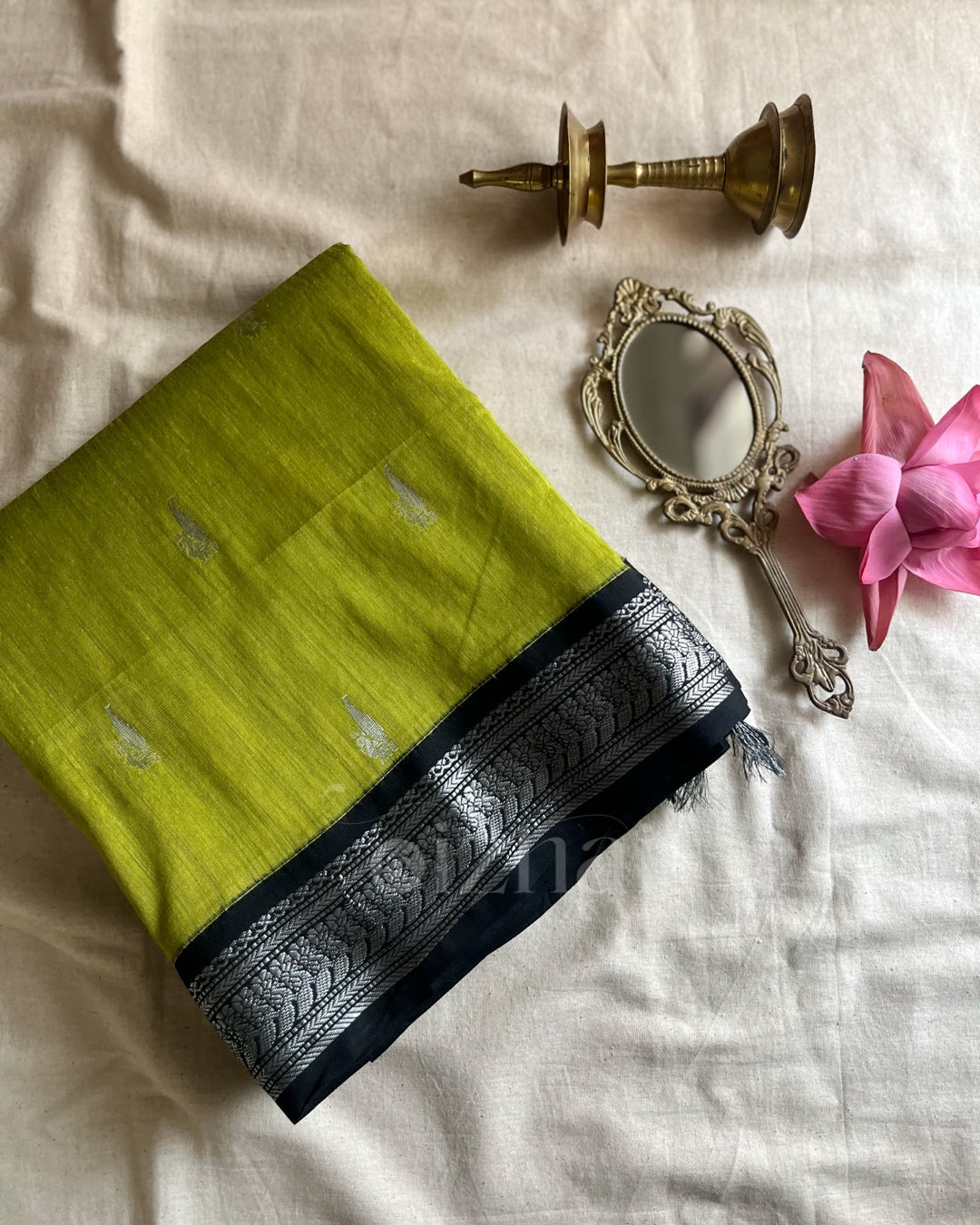 Kanchi || Parrot green